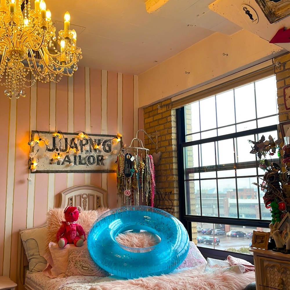 Juicy Couture glitter blow up pool raft and back pack store display